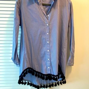 Blue and white stripped top with black Pom poms